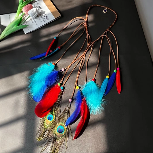 украшение на волосы с перьями