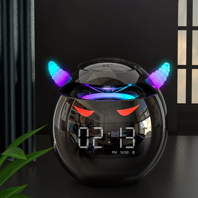 настільний годинник з колонкою