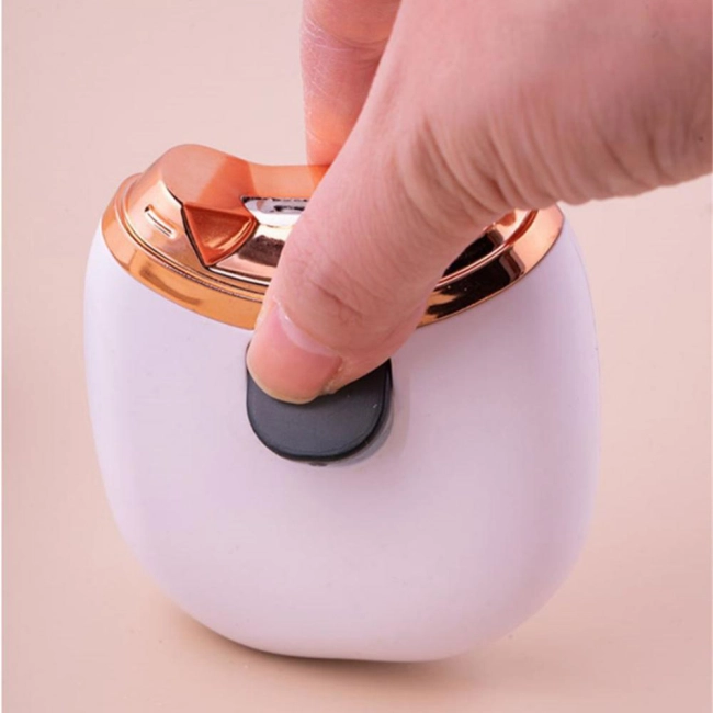 апарат для стрижки нігтів