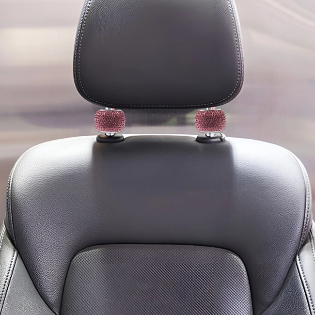 Прикраса для підголівника автомобіля