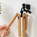 клейкий крючок на стену