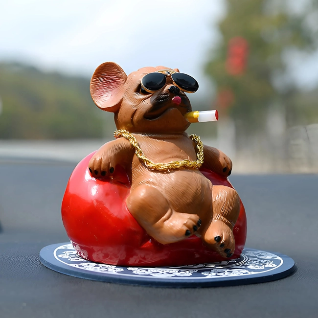 статуетка собаки в машину