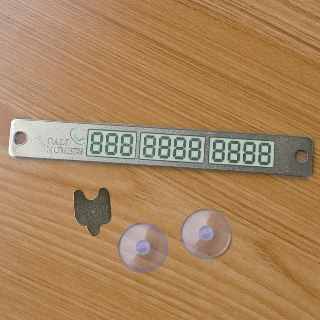 табличка на лобове скло з номером телефону