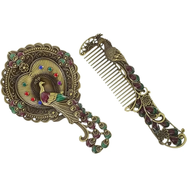 гребінець із дзеркалом павич