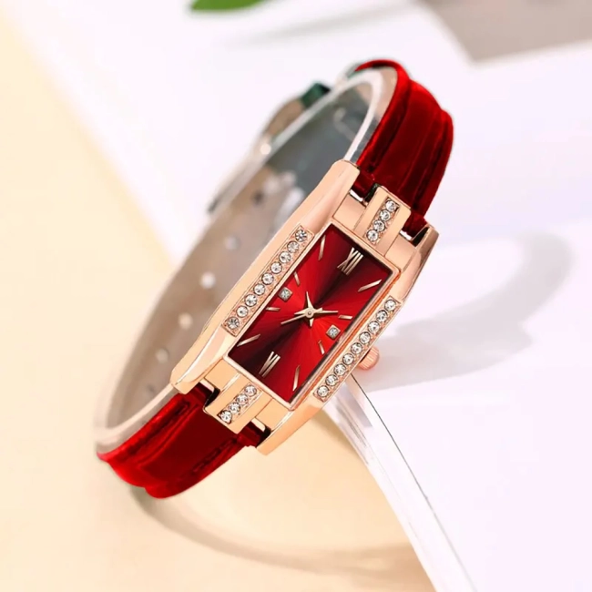 жіночий годинник прикрашений камінням