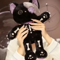 игрушка в виде котенка