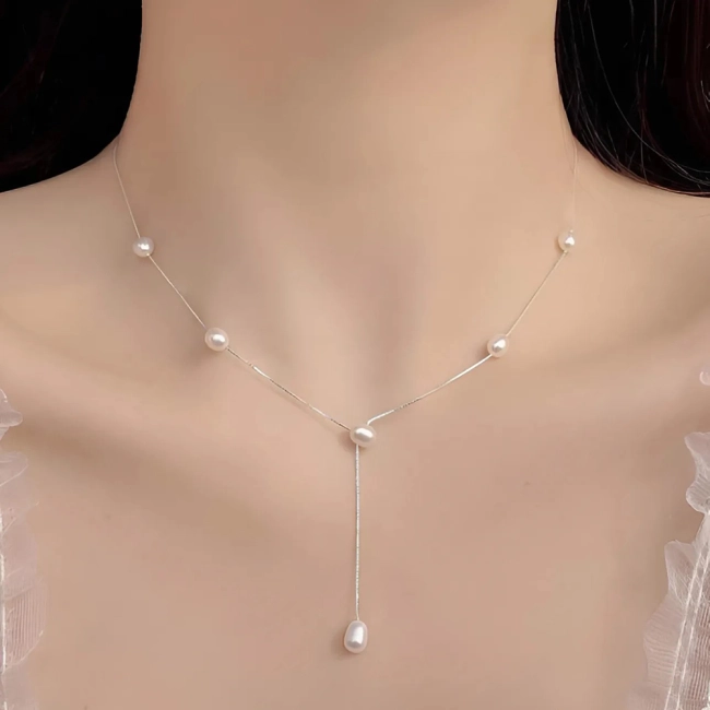 жемчужное ожерелье для женщины