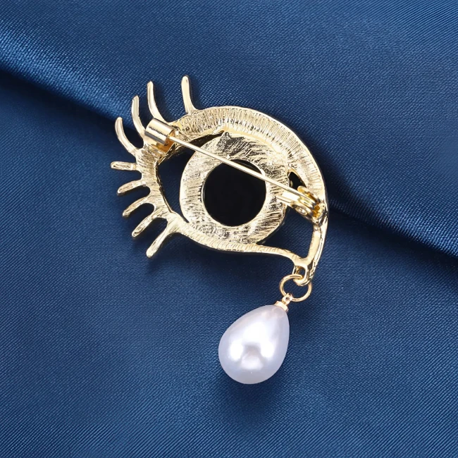 брошь в виде глаза