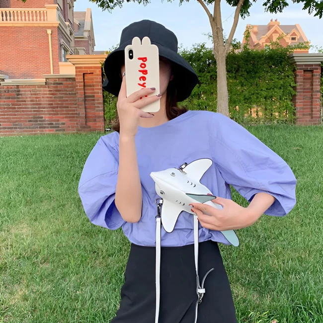 сумка через плече з регульованим ремінцем