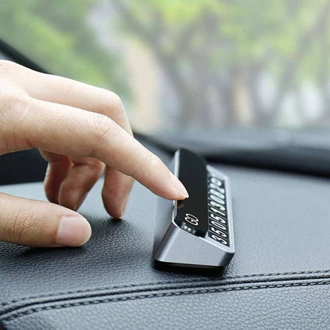 паркувальна автовізитка з номером телефону в машину